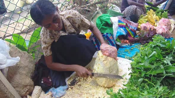 Hikkaduwa, Sri Lanka - March 2014: Woman Cutting Durian Fruit With Big Knife At Sunday Market 2