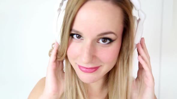 Beautiful Young Blond Woman Dancing With White Headphones 33 alt