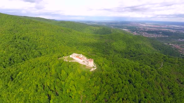 Aerial View Of Fort Medvedgrad With Forest Around It And Cityscape In Distance. 1