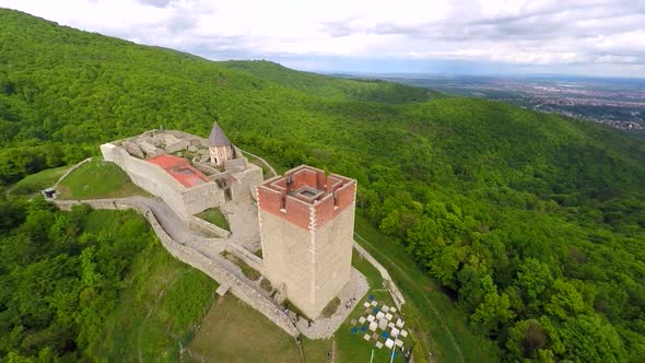 Aerial View Of Fort Medvedgrad With Forest Around It And Cityscape In Distance. 4 alt