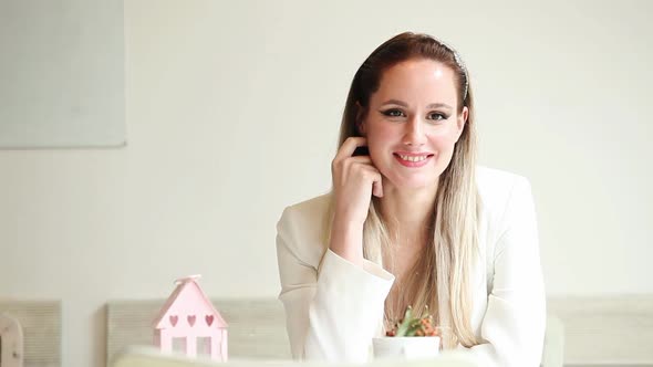 Beautiful Young Woman Sitting In The Cafe Smiling 9