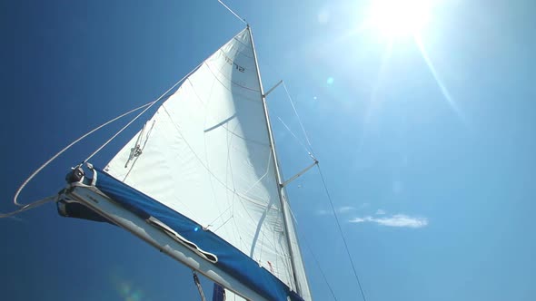 Sail Floating In The Wind On A Beautiful Sailboat 1