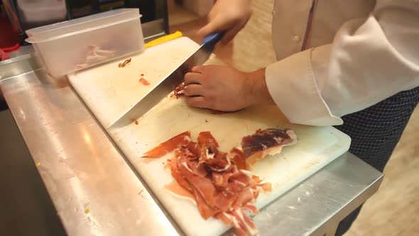 Chef Chopping Bacon In Restaurant 1
