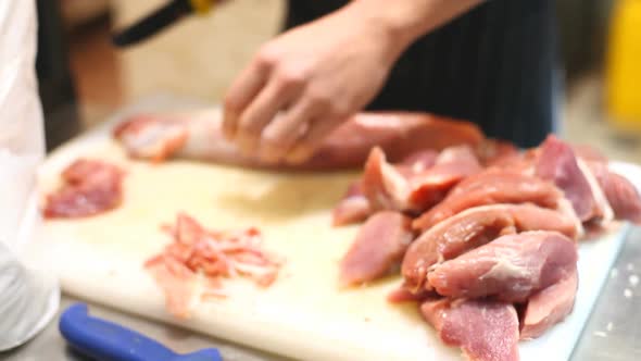 Chef Cooking Meat In Kitchen Of Restaurant 6