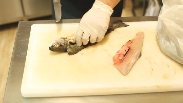 Chef Cutting Fish In Restaurant 2