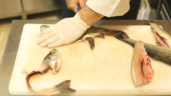 Chef Cutting Fish In Restaurant 4