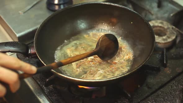 Stir-Fry Noodles Prepared In Wok alt