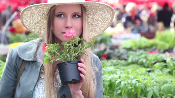Close Up Of A Girl Smelling Flowers 3 alt