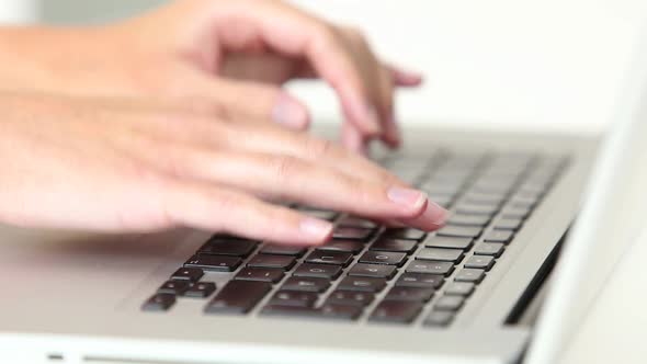 Womans Hands Typing On Laptop Keyboard 2