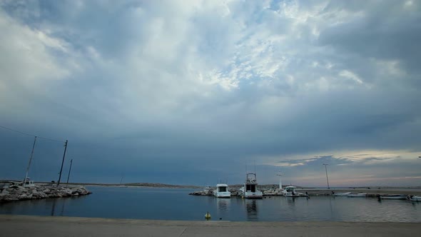 Timelapse Of Clouds Passing Over Harbour On Croatian Island.