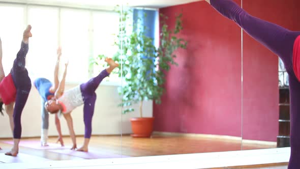 Women Doing Yoga Class In Hall 29