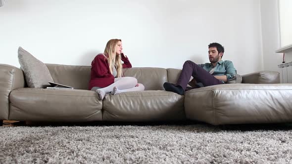 Tracking Shot Of Couple On Couch In Living Room 1