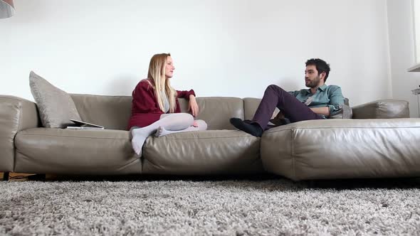 Tracking Shot Of Couple On Couch In Living Room 2 alt