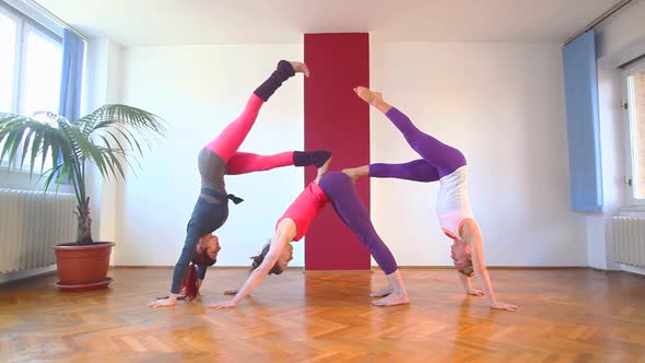 Women Doing Yoga Class In Hall 43