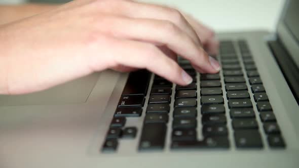 Tracking Shot Of Womans Hands Typing On Keyboard 1