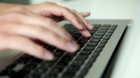 Tracking Shot Of Womans Hands Typing On Keyboard 2