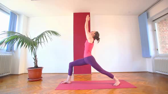 Women Doing Yoga Class In Hall 58