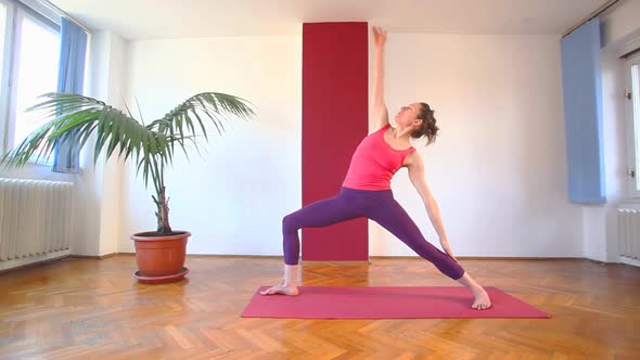 Women Doing Yoga Class In Hall 61