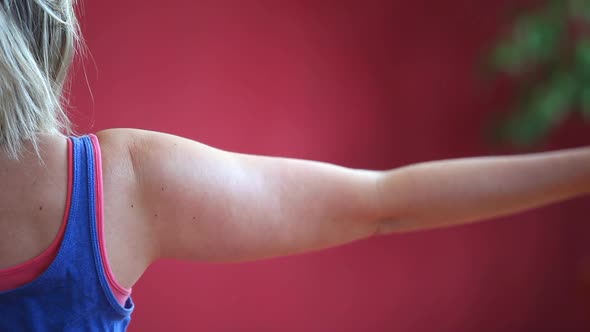 Women Doing Yoga Class In Hall 9 alt