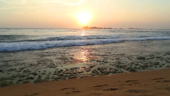 Ocean View In Hikkaduwa In Sunset With Waves Splashing The Beach. 6