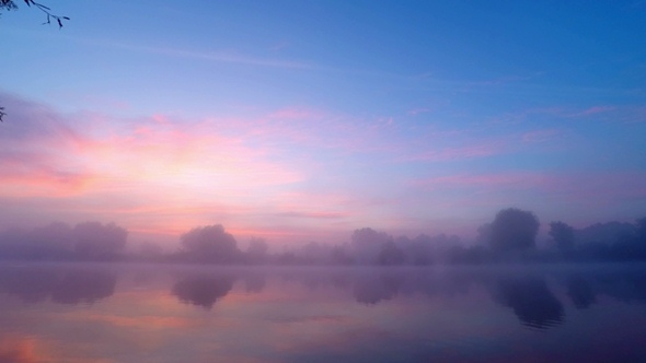 Sunrise  in  Fog on River Water. 