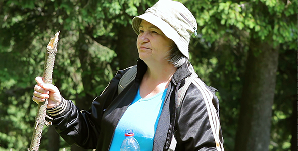 Senior Tourist Woman Drinking Water