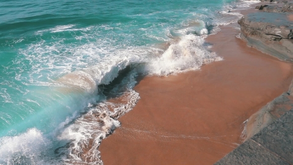 Slow Motion Ocean Waves Breaking On Shore