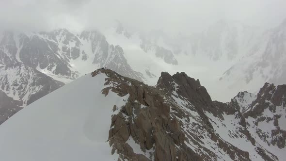 Mountaineers on Top of Mountain. Tian Shan, Kyrgyzstan. Aerial View