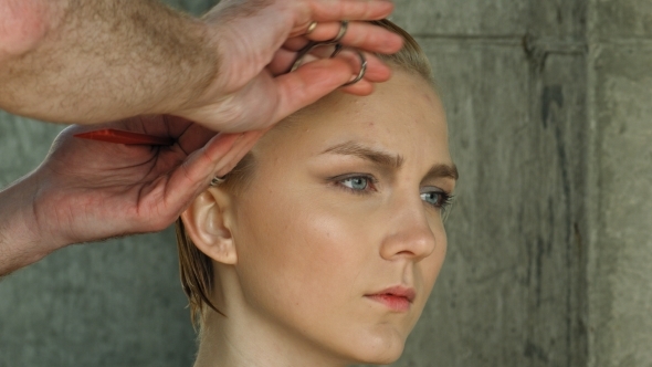 New Haircut For Blond Woman In Salon