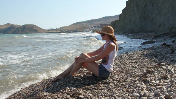 Young Woman On The Shore