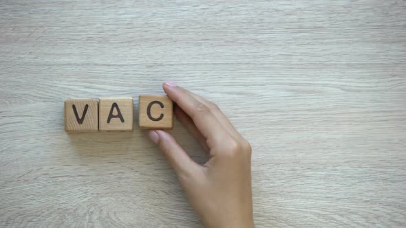 Vacation, Hand Putting Word on Wooden Cubes, Family Holiday Rest From Work