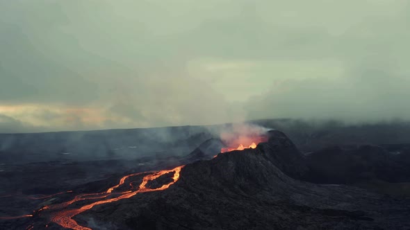 Aerial View Of Volcano Erupting With Lava Flow - drone shot