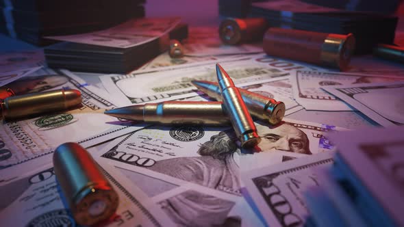 Ammo bullets in the middle of mafia table stacked with cash. Neon lights. 4KHD