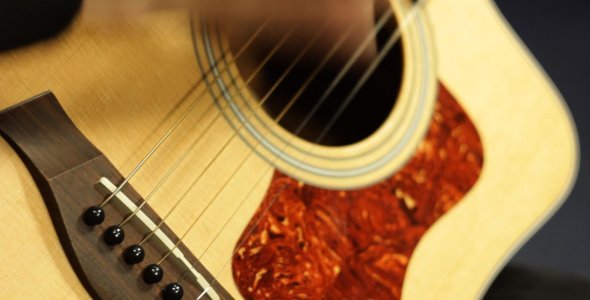 Playing Acoustic Guitar in Studio