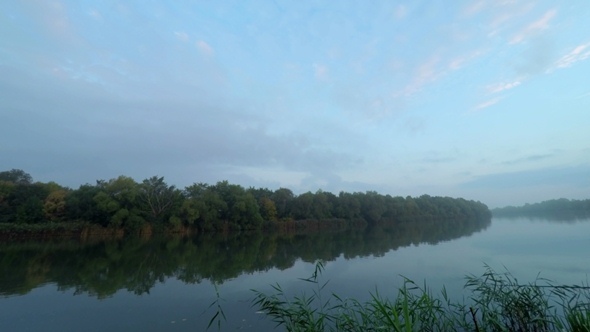 Sunrise  in  Fog on River Water. 