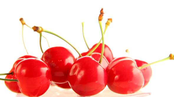 Cherry Rotates On a White Background