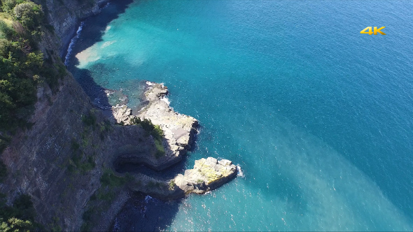 Aerial Fly Over High Rocky Cliff Coast (3 Clips)
