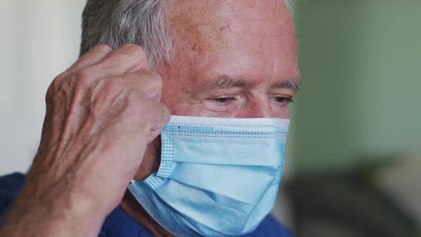 Portrait of senior caucasian man wearing face mask