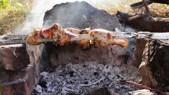 Kebabs With Chicken Are Cooked On The Fire