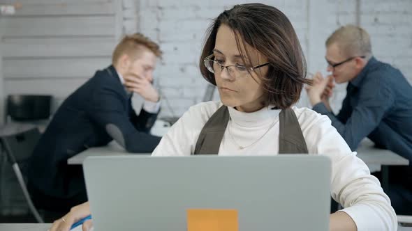 Beautiful Lawyer Agent Is Working with Computer at the Office