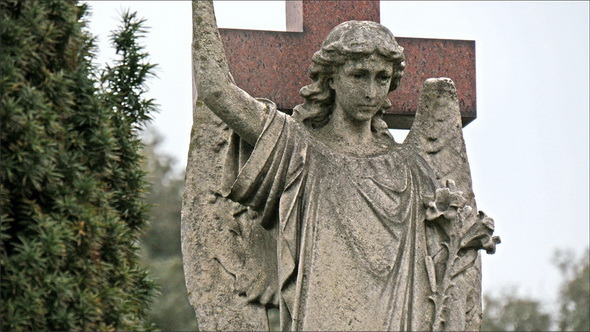 A Statue of a Lady Angel in the Cemetery