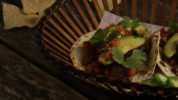 Rotating Shot of Delicious Tacos on A Wooden Surface