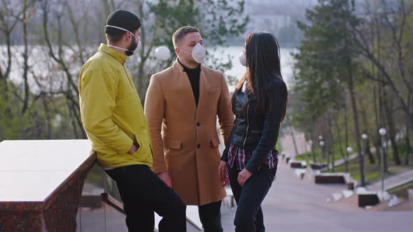 Young Students Have a Discussion in the Park They