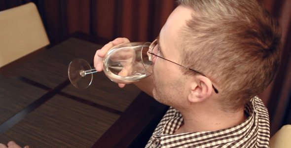 Man Drinks Water