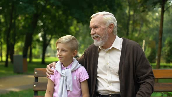 Grandpa Telling Grandson Interesting Things, Sharing Knowledge and Experience