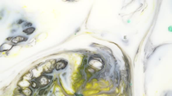 Colorful Background Of Liquid Paints Moving On White Surface