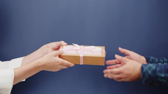 Square Cardboard Box on Blue Background