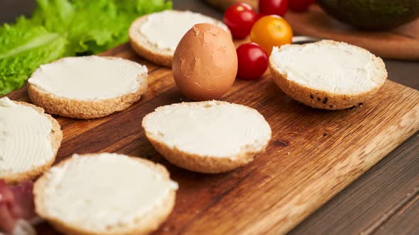 Making Keto Burgers with Salmon, Bacon and Avocado. Stop Motion Animation. Keto Sandwich