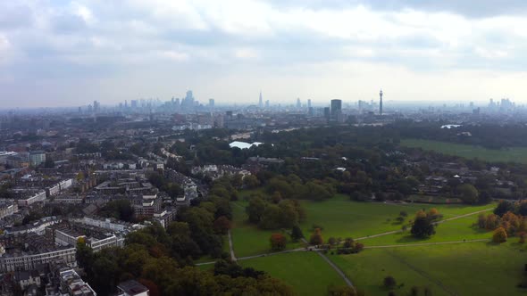 Beautiful Aerial View of London with Many Green Parks and City Skyscrapers