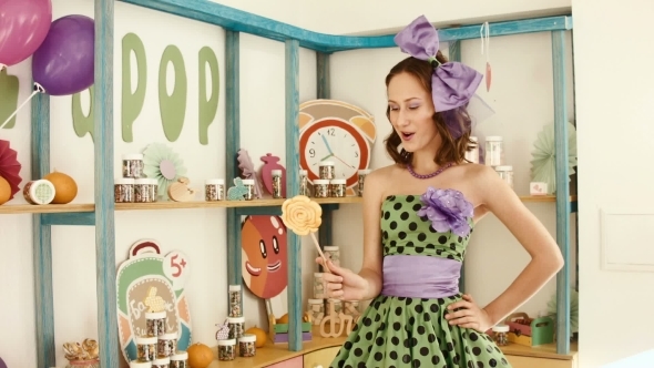 The Girl In a Bright Dress licks Big Candy